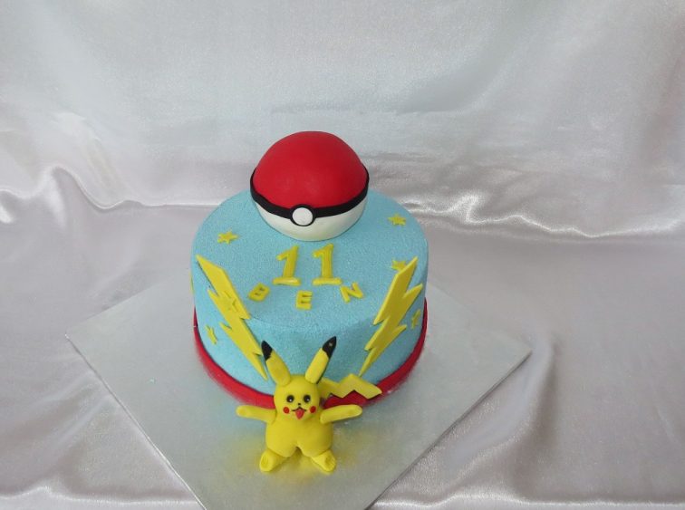 Pokemon Poke Ball cake with Pikachu