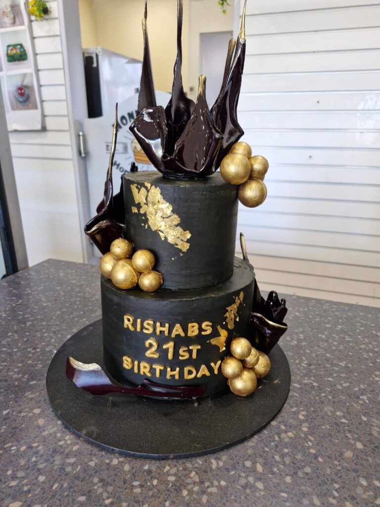 2-Tier Black and Gold Cake